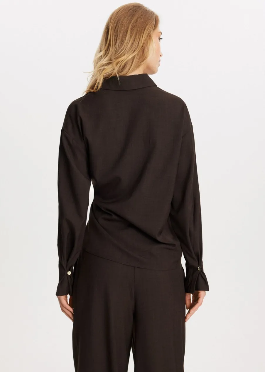 The Sting Blouse met knoopdetail<DAMES Blouses