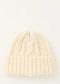 The Sting Muts met kabelpatroon<DAMES Mutsen