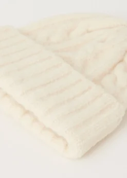 The Sting Muts met kabelpatroon<DAMES Mutsen