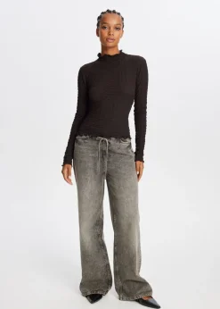 The Sting Top met strikdetail<DAMES Tops