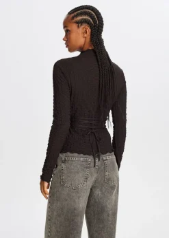 The Sting Top met strikdetail<DAMES Tops