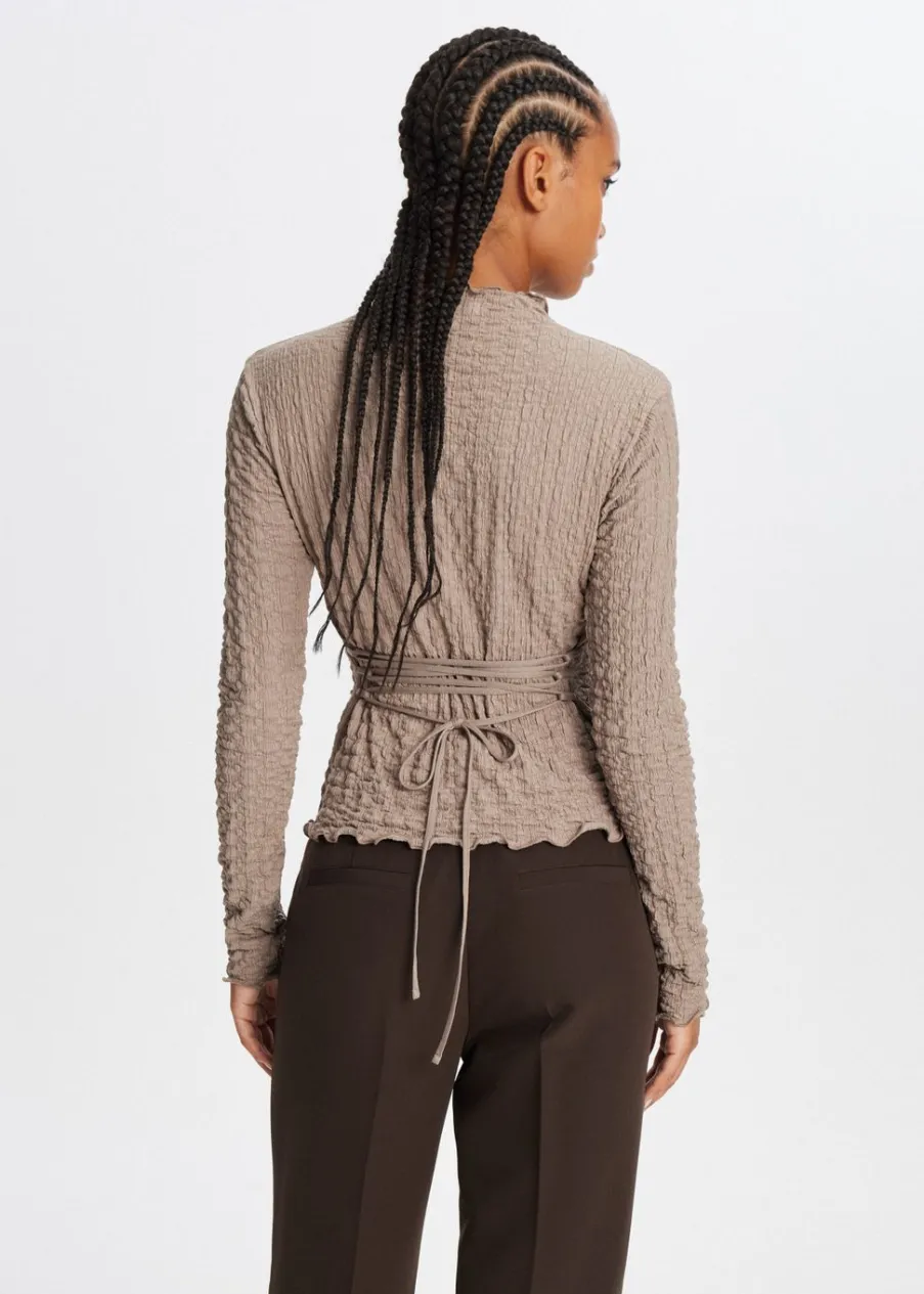 The Sting Top met strikdetail<DAMES Tops