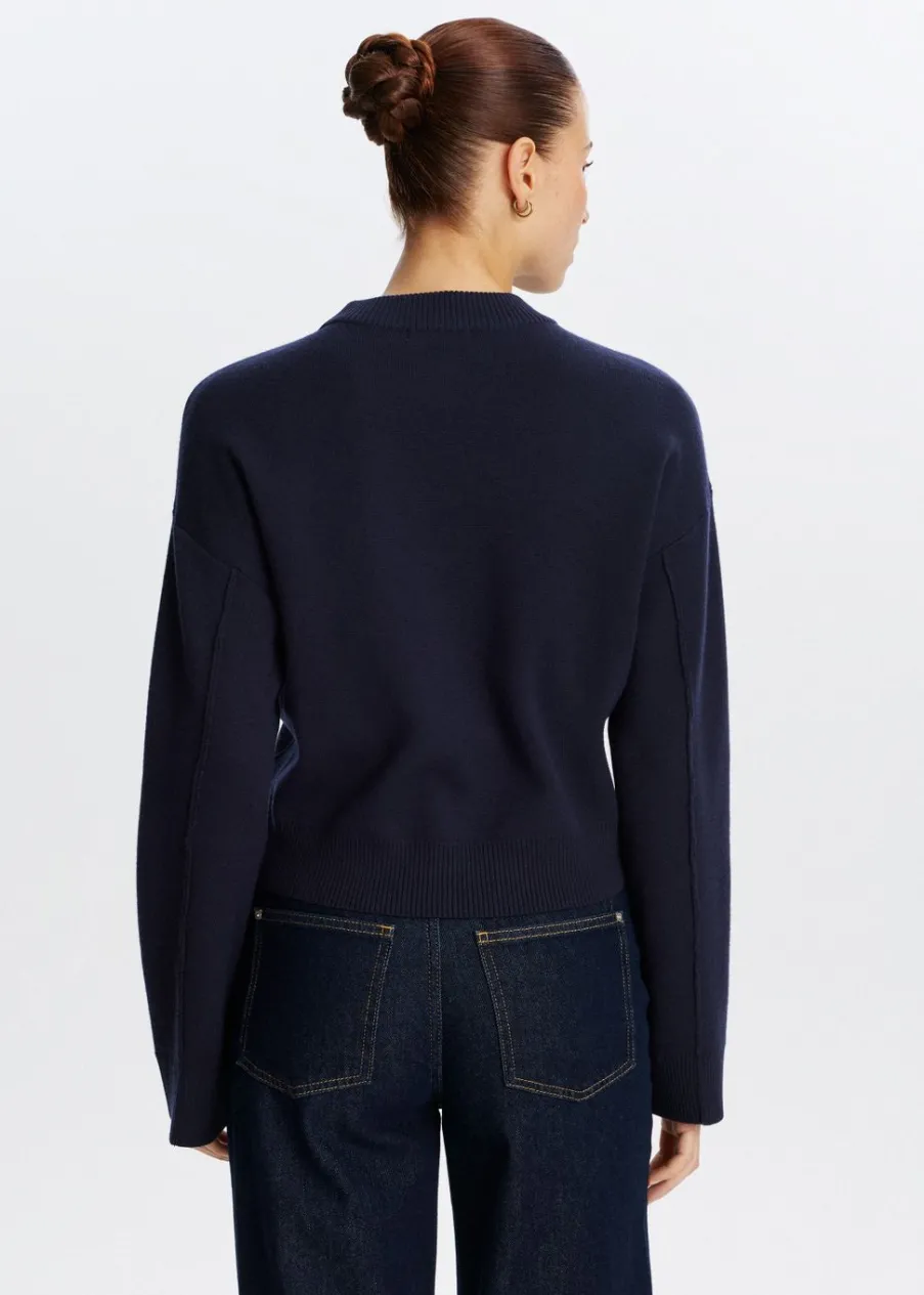 The Sting Trui met label<DAMES Truien En Vesten