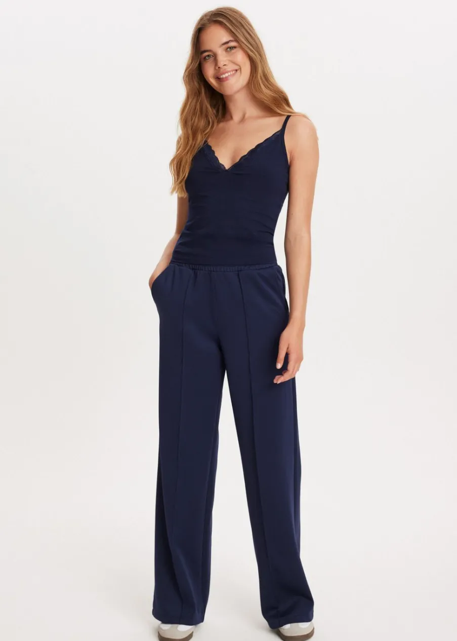 The Sting V-hals singlet met kant<DAMES Basics|Singlets